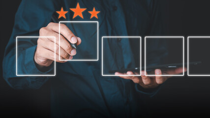 Business people use the index finger to touch the virtual screen to select the starred icons, future digital technology working in digital form, business strategy concepts, human business concepts.