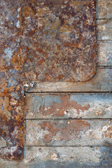 Texture of old wooden planks and rusty iron. Rough dirty surface of metal and wood. Perfect for background and design.