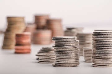Piles of Thai baht coins arranged in descending order, concept of money and statistics, investment concept. 