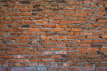 The texture of a red brick wall. Background