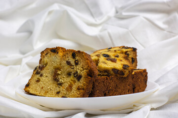 cupcake with raisins on a white plate morning breakfast