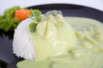 Green curry (Kaeng kheiyw hwan) with Thai food for steamed rice or rice noodles. Thai food very popular