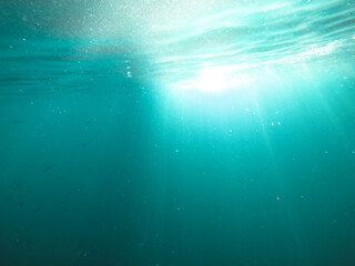 underwater texture shot blue sea water with sunbeam