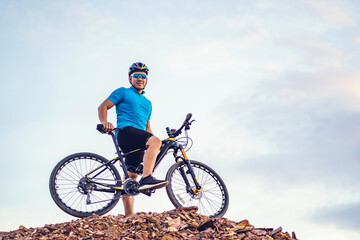 Mountain bikes cyclist cycling, Asian man athlete riding biking on rocky terrain trail track, extreme sport wearing gear uniform helmet, exciting joy freedom outdoor nature healthy active lifestyle