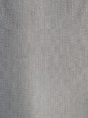 Fototapeta premium texture of curtain background to filter out the sunlight inside the building. Abstract image of texture
