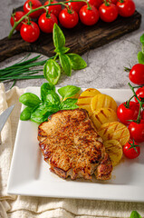 Delicious pork steak with herbs sauce