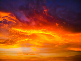 Naklejka na ściany i meble Dramatics sky during the golden sunset