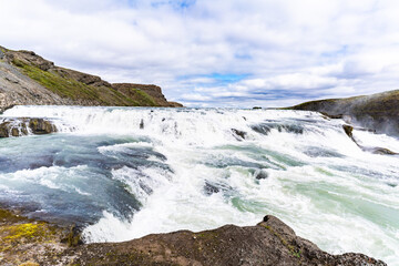 Fototapeta premium Der Gullfoss - zweistufiger Wasserfall im Süden Islands