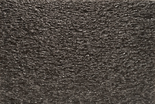 Black EPE foam polyethylene packaging as background