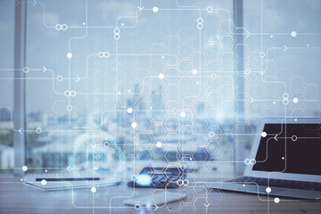 Double exposure of desktop computer and technology theme hologram. Concept of software development.