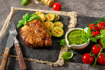 Delicious pork steak with herbs sauce