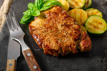 Delicious pork steak with herbs sauce
