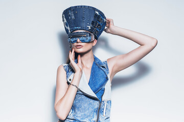 woman in denim hat and sunglasses