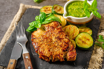 Delicious pork steak with herbs sauce