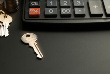 Financial accounting for Home loans,Keys and money calculator on table