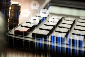 Financial accounting, money calculator on table