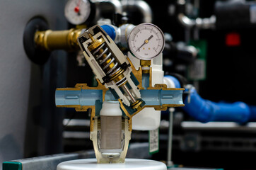Pressure reducing valve. With filter and pressure gauge. Cross section