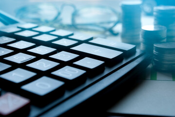 Financial accounting, money calculator on table