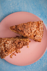 Slices of homemade sponge cake with cinnamon and sesame.