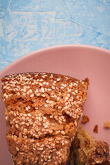 Slices of homemade sponge cake with cinnamon and sesame.