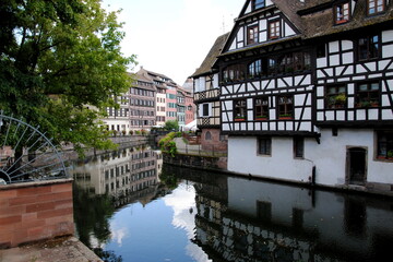Fototapeta na wymiar Medieval half-timbered houses in the historic quarter La Petite France on Grand Île, Strasbourg, a UNESCO World Heritage Site (