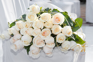 Bouquet of cream roses. Cream roses putting together many of flowers. Floral abstract background for your art project.