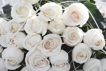 Bouquet of cream roses. Cream roses putting together many of flowers. Floral abstract background for your art project.