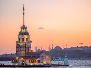 Fototapeta premium Maiden tower landmark in Istanbul Bay, beautiful view of the evening city
