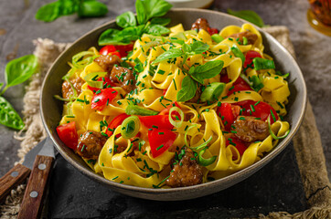 Chinese noodles with pork meat and herbs