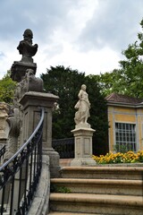 Fototapeta na wymiar Staircase with stone statue in Rechberggarten in the city of Zurich Switzerland