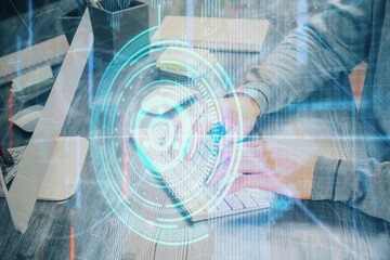 Double exposure of tech drawings with hands working on computer background. Concept of innovation.