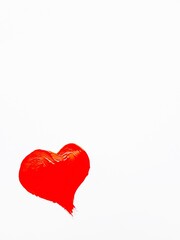 Red heart painted on a white background. Happy Valentine's Day.