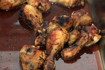 Chicken, rice and salad on a serving plate