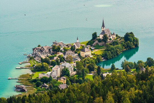 View of the Worthersee lake with Maria Worth church, Carinthia, Austria