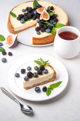 Classic New York Cheesecake And Tea on grey  Background, Tea and Cheesecake 