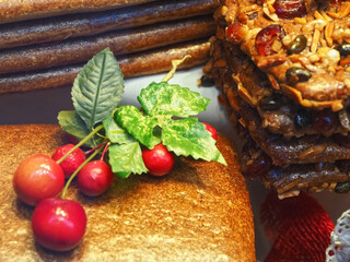 Delicious gingerbread cookies for christmas with cherries