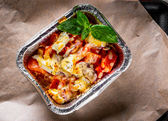 Baked vegetables and feta cheese in a baking dish