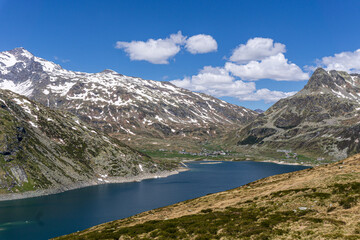 Fototapeta na wymiar A lake during the summer in the Italian Alps, near the town of Madesimo, Italy - June 2020.