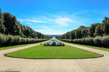 Fototapeta premium View of the royal palace and cascade of waterfalls in the palace park in Caserta, Italy.