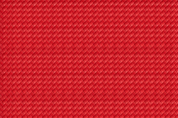 Red leather material background. Upholstery. Texture. Close-up