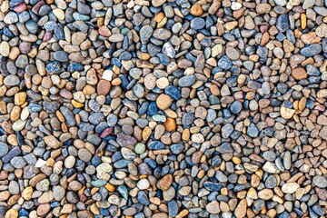 Small stone gravel of various colors background and pattern