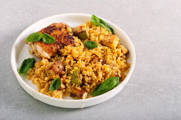 Chicken thigh with bulgur and zucchini