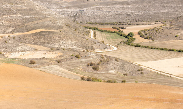 landscape of a semi-arid steppe and agricultural fields next to Rello village, province of Soria, Castile and Leon, Spain