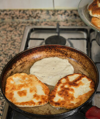Pan-fried pastry. Baking pastry in the pan. Turkish pastry type bagel 
