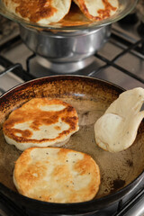 Pan-fried pastry. Baking pastry in the pan. Turkish pastry type bagel 