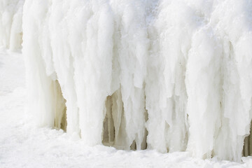 Frozen coast sea in winter. Everything was covered with ice background