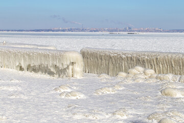 Frozen coast sea in winter. Everything was covered with ice background.