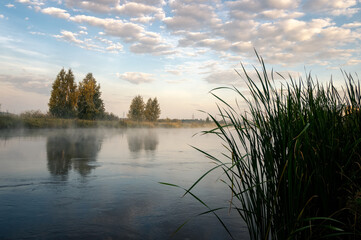 morning landscape on the shore of the Ural lake with fog, Russia, Ural, August