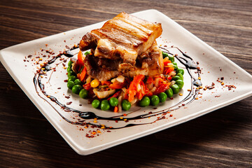 Roasted ribs with vegetables
