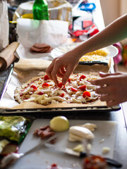 Making pizza in domestic kitchen